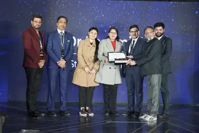 Eminence MSME Awards: Group of awardees with trophies on stage