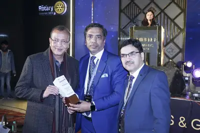 Eminence MSME Awards: Guests exchanging a memento near the podium