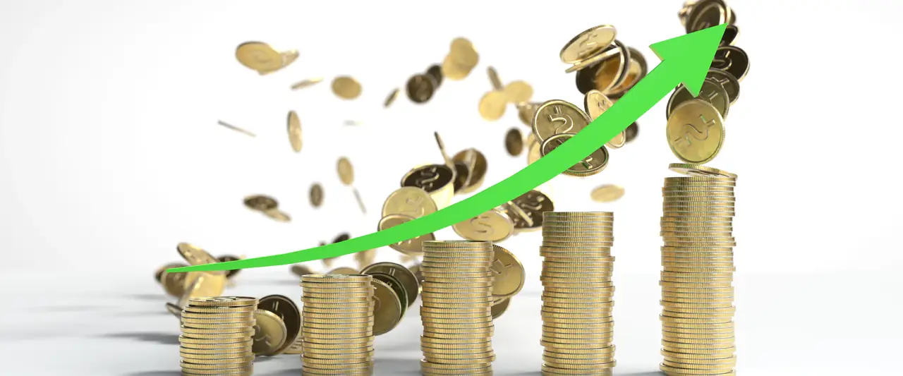 Stacks of gold coins with a rising trend line