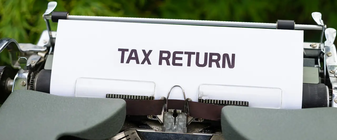 Tax return paper in a typewriter