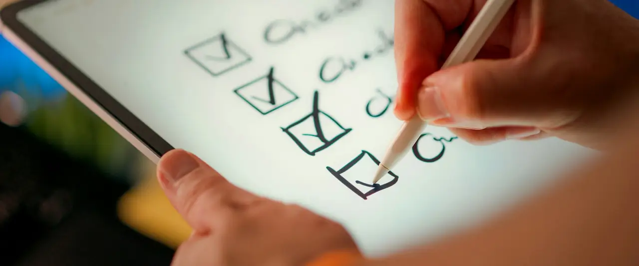 Checklist being completed on a tablet