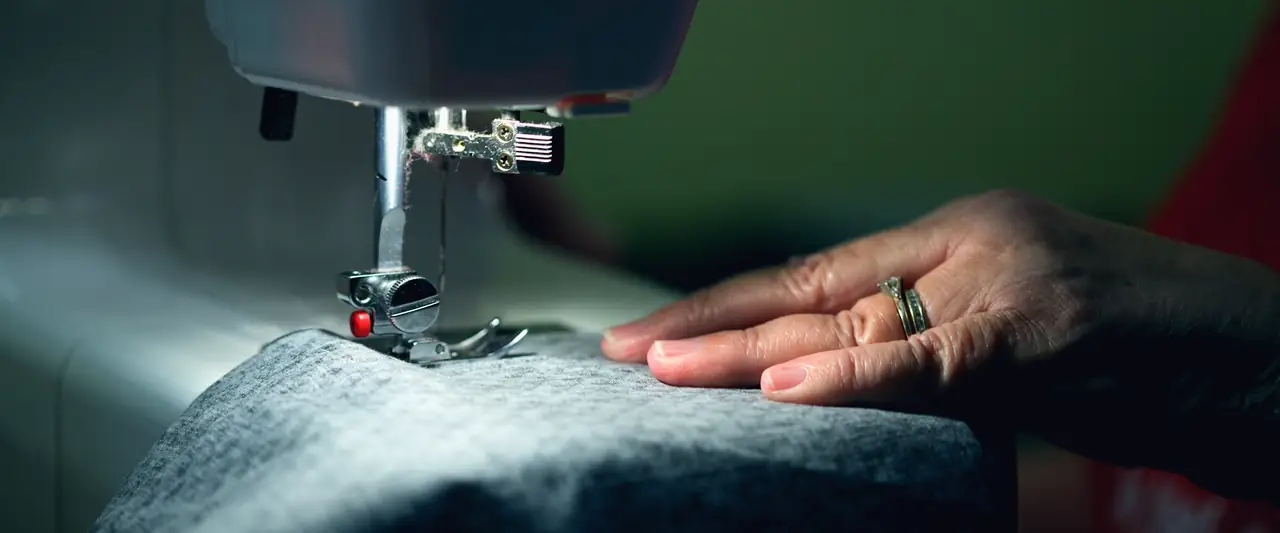 Small tailoring business at a sewing machine