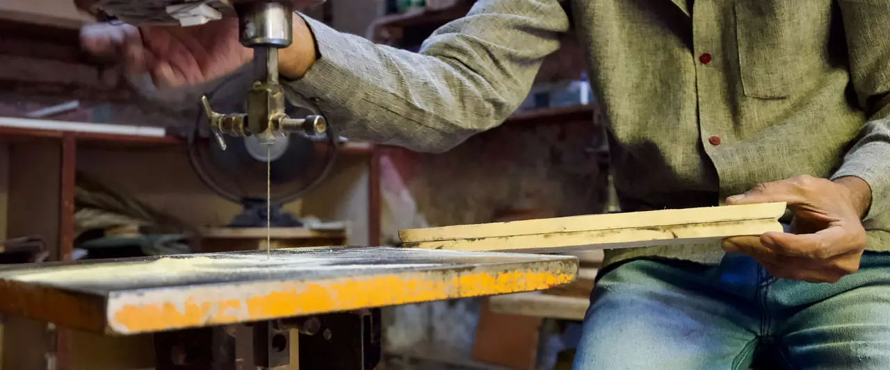 Carpenter at work in a small enterprise