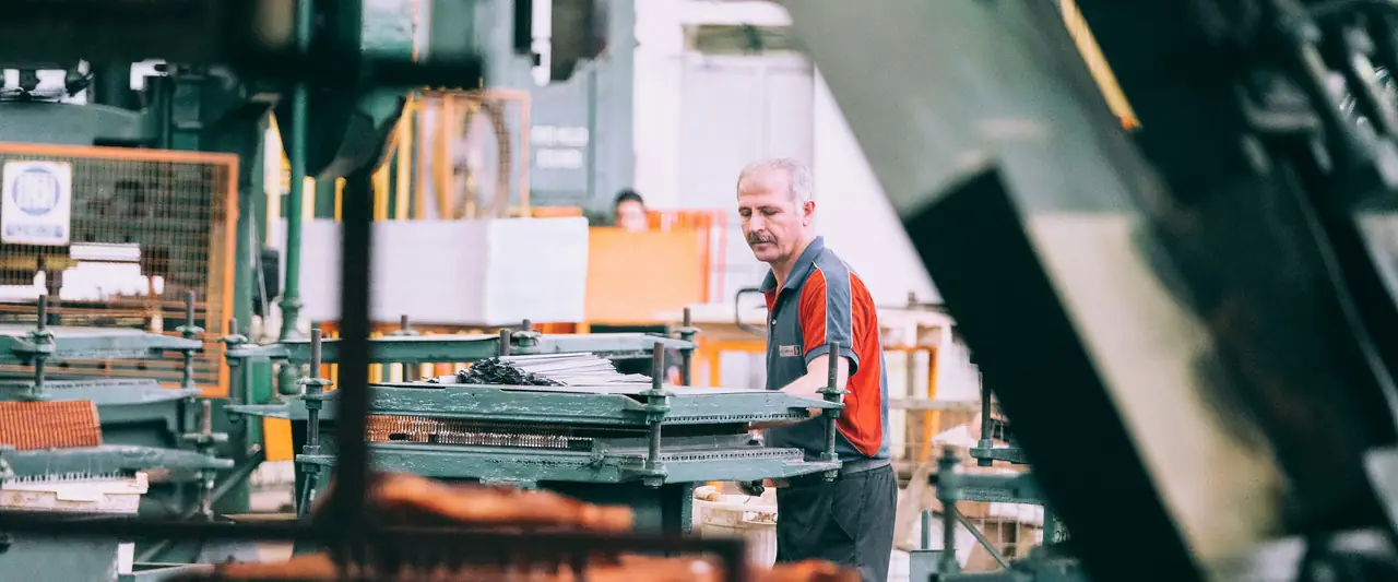 Operator running industrial machinery